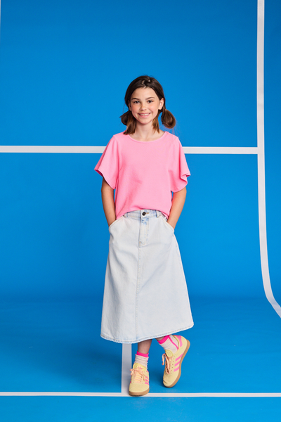 Soft pink, iconic denim